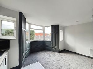Living area and bedroom- click for photo gallery